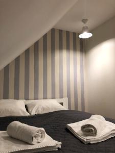 Postel nebo postele na pokoji v ubytování Dom Tkacki - Apartamenty - Pokoje - Jacuzzi