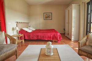 Postel nebo postele na pokoji v ubytování Casa Montecote Eco Resort