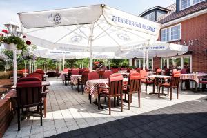 Restoran või mõni muu söögikoht majutusasutuses Hotel Neuwarft Altbau