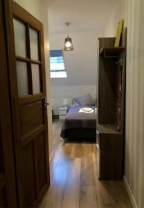 Postel nebo postele na pokoji v ubytování Dom Tkacki - Apartamenty - Pokoje - Jacuzzi