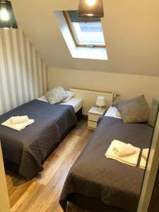 Postel nebo postele na pokoji v ubytování Dom Tkacki - Apartamenty - Pokoje - Jacuzzi
