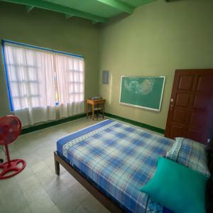 Postel nebo postele na pokoji v ubytování Hostal Juan Lindo + 37 fotografií