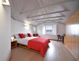 Giường trong phòng chung tại Casa da Baía - Guest House