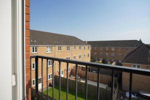 a view of some buildings from a balcony at Stylish Apartment with Private Parking in Cardiff