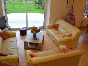 A seating area at Modern Cottage in Normandy with Large Garden