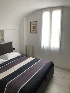 Giường trong phòng chung tại Ca' Tancin