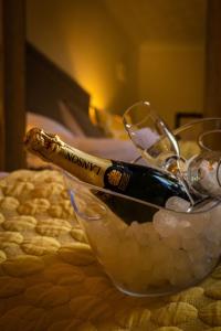 a bottle of champagne in a bowl of ice at The Leagate Inn in Coningsby