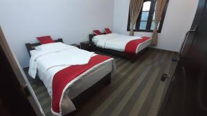 Letto o letti in una camera di Hotel Bhagya