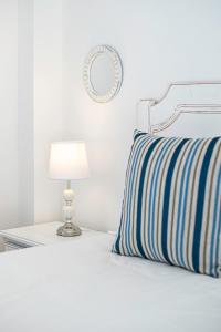 A bed or beds in a room at Villa Maday