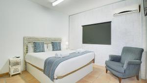 A bed or beds in a room at Villa Maday