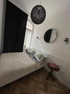 Posteľ alebo postele v izbe v ubytovaní Apartament Victor20