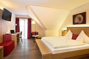מיטה או מיטות בחדר ב-Landgasthof Euringer
