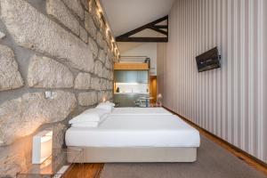 Ένα ή περισσότερα κρεβάτια σε δωμάτιο στο GuestReady - Porto de Rio