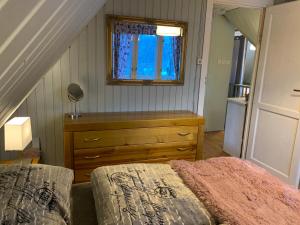 Letto o letti in una camera di Sosnowy Zakatek