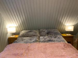 Letto o letti in una camera di Sosnowy Zakatek