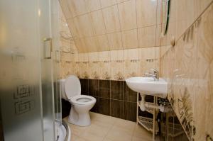 Kúpeľňa v ubytovaní Pokoje Apartamenty Pod Limbą