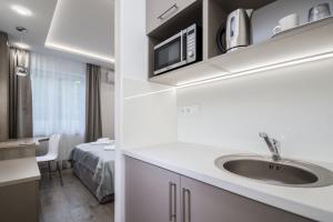 Η κουζίνα ή μικρή κουζίνα στο Hévízi Tópark Panzió III.