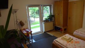 Ein Bett oder Betten in einem Zimmer der Unterkunft Pension "Am Schloß"
