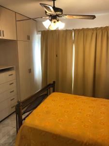 Ένα ή περισσότερα κρεβάτια σε δωμάτιο στο Casa Miradores del Lago