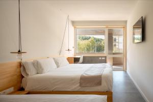 Cama o camas de una habitación en Cristina Enea Rooms