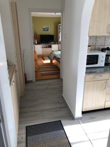 Kuchyňa alebo kuchynka v ubytovaní Leander Apartman Balatonakali