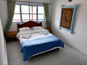 Laureles de la Villa客房内的一张或多张床位