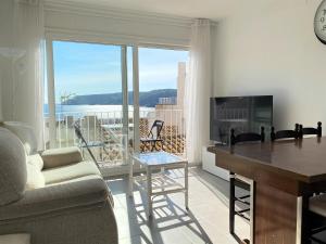 Posedenie v ubytovaní TÒRTORA - Casa en el centro con vistas al mar