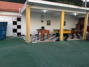 Fotografie z fotogalerie ubytování Ótima casa com piscina em Praia Grande v Sao Paulu