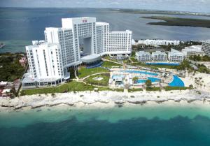 an aerial view of a resort on the beach at Riu Palace Peninsula - All Inclusive in Cancún