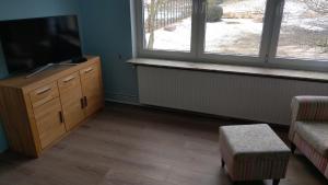 TV a/nebo společenská místnost v ubytování Haus Kleeblatt
