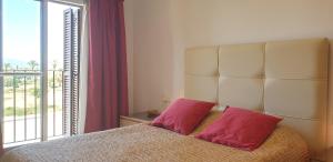 Łóżko lub łóżka w pokoju w obiekcie Homes of Spain, Al Andalus Thalassa JO, Apartamento con vistas, WIFI