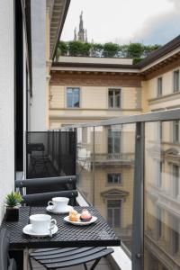 Photo de la galerie de l'établissement BMORE Duomo - Luxury Apartments near Duomo, à Milan