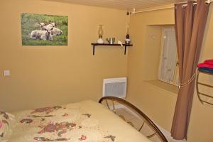Postel nebo postele na pokoji v ubytování Le Pré de Luceau + 7 fotografií