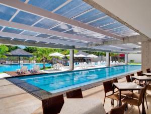 A piscina localizada em Apartamento Le Jardin ou nos arredores
