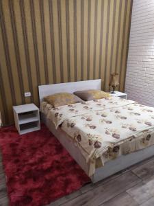 Postel nebo postele na pokoji v ubytování Mini Hotel na Gasheka