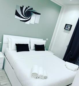 Postel nebo postele na pokoji v ubytování One Hundred Rooms