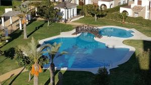 Basen w obiekcie Homes of Spain, Al Andalus Thalassa JO, Apartamento con vistas, WIFI lub w pobliżu