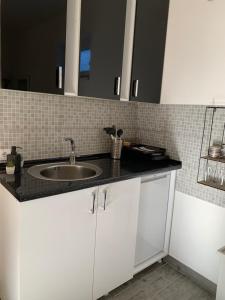Kuchyň nebo kuchyňský kout v ubytování Apartman Hana + 9 fotografií