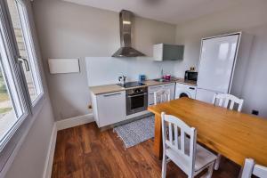 Una cocina o zona de cocina en Apartamentos Playa de Camariñas
