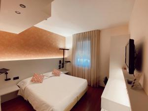 Tempat tidur dalam kamar di Best Western Hotel Solaf