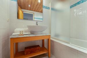 Ett badrum på Appartement Clusettes - Happy Rentals