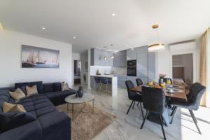 Kuchyňa alebo kuchynka v ubytovaní Apartman Blue Wave