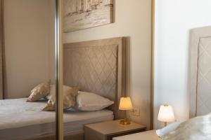 Posteľ alebo postele v izbe v ubytovaní Apartman Blue Wave