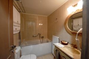 Koupelna v ubytování Armonia Hotel