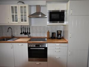 Photo de la galerie de l'établissement Gemütliche Ferienwohnung mit Garten in Robertsdorf, à Blowatz