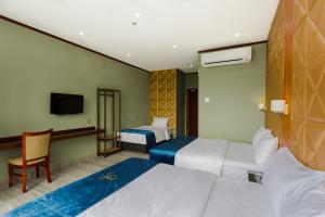 Postel nebo postele na pokoji v ubytování U3 HOTEL