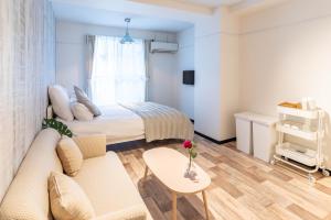 Ένα ή περισσότερα κρεβάτια σε δωμάτιο στο Bijou Suites Antico