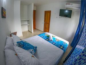 Hotel Arena Azul客房内的一张或多张床位