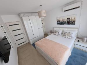 Кровать или кровати в номере Briza pe promenada
