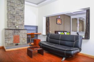 Posezení v ubytování Yantra Resort By Spree Ooty